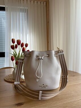 kate spade Cream Leather Drawstring Bucket Shoulder Bag with Striped Strap